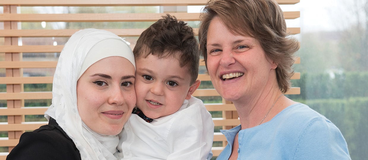 Becky Cable, and a mother, holding her son