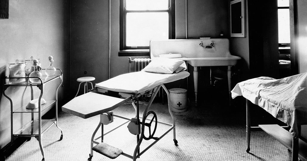 A black and white photo of a surgical dressing room