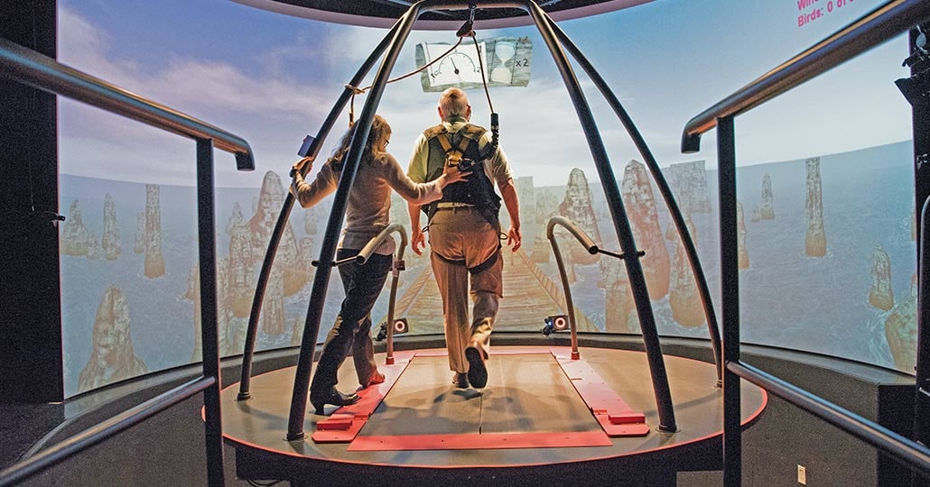 Patient in a rehabilitation machine, walking 