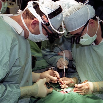 Doctors perform a surgery 