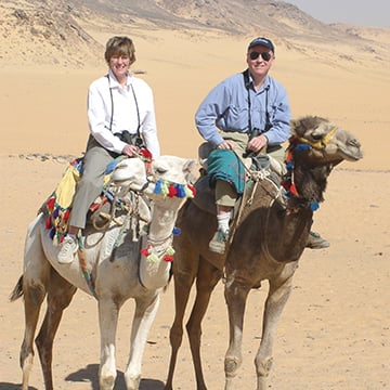 Bill and Linda on camels in Egypt