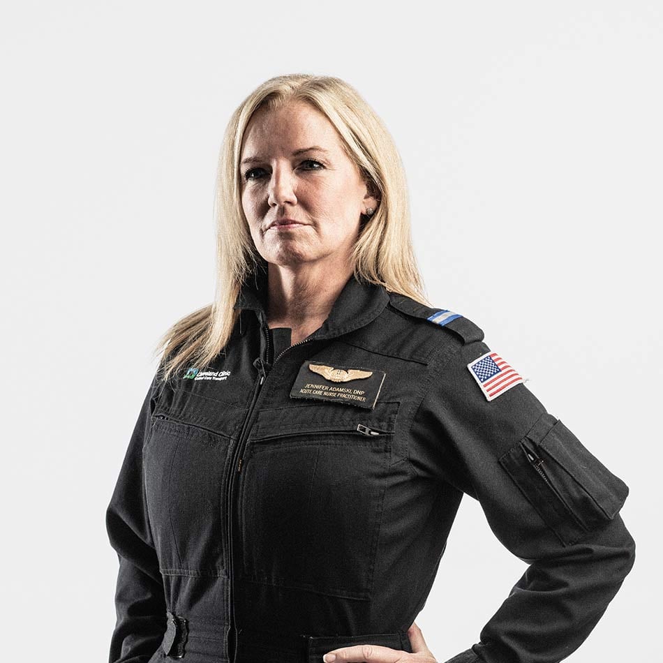 Jennifer Adamski posing for photo in uniform