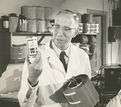 Willem Kolff, MD, PhD, holding a can